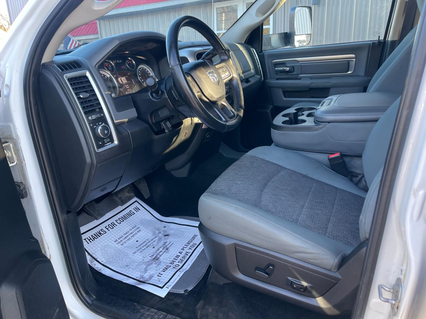 2016 White /Black RAM 2500 Outdoorsman Crew Cab SWB 4WD (3C6UR5DL4GG) with an 6.7L I6 OHV 24V TURBO DIESEL engine, 6A transmission, located at 11115 Chardon Rd. , Chardon, OH, 44024, (440) 214-9705, 41.580246, -81.241943 - Photo#19